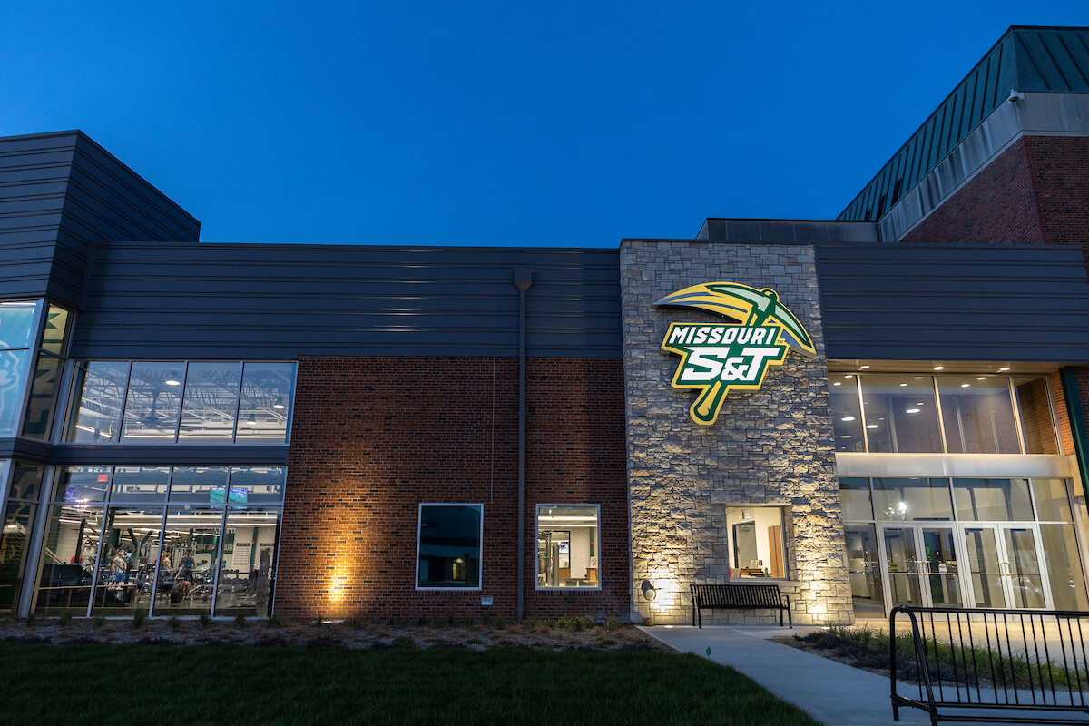 an exterior photo of the rec center at night